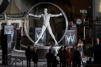 A 13-foot 'Vitruvian Man' sculpture stood on the press line atop a rotating pedestal.