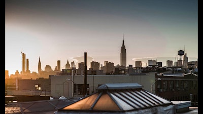 The Manhattan skyline can be seen from the Dobbin St roof deck.