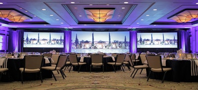 The perfect meeting space with two 9- by 16-foot screens and a 13.5- by 24-foot screen in the center