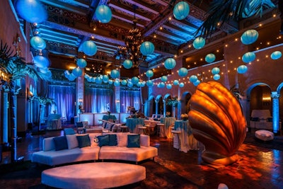 A large shell decor piece and blue lanterns decorated the lobby of the Hollywood Roosevelt as part of an ocean theme inspired by the last scene in Masterminds.