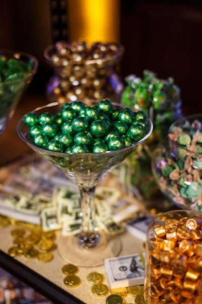Green and gold candies decorated the bank-theme dessert display.