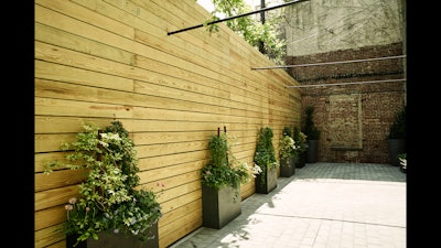 The hidden courtyard is 900 square feet and was landscaped by Brooklyn favorite, Sprout Home.