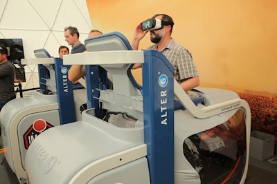 Guests zipped into special low-gravity treadmills and wore VR goggles to experience what it's like to walk on Mars.