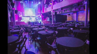 Banquet tables were set up for audience seating of a game show.