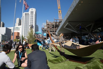 Organizers designed Dreampark, located between Moscone North and South, to feel like a park, with hammocks, picnic tables with umbrellas, and bean bags. The area also included games, karaoke, music from more than 25 bands on two stages, volunteer opportunities, and viewing of the keynote sessions on large screens.