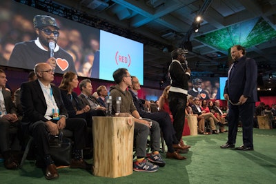 In the keynote theater, tree stumps served as end tables.