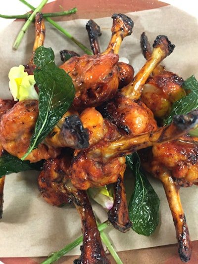 Tandoori-style beer-braised chicken drumettes, served with a sauce made of honey, soy sauce, lager, and tandoori spice, by Wolfgang Puck Catering at the Georgia Aquarium in Atlanta