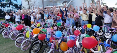 A large crowd after a bike build.