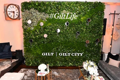 The spa and beauty event took place on October 5. The step-and-repeat wall was changed to incorporate round makeup mirrors into the greenery.
