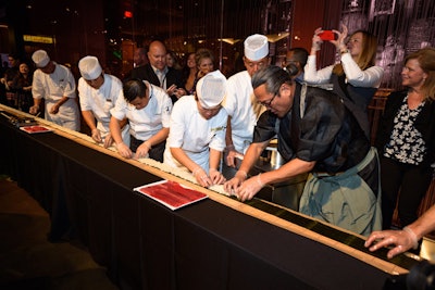 Morimoto Las Vegas opened with a party that included dozens of participants making a 100-foot-long maki roll.