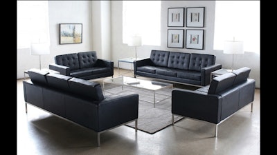 Black leather button tufted Knoll-style sofas and loveseats