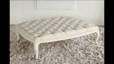 Antique white linen tufted ottoman