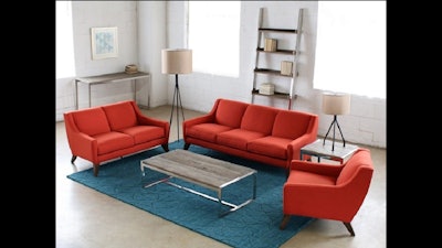 Tightback rust sofa and chairs with splayed walnut legs