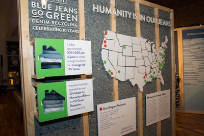 Another wall featured a backdrop made of insulation that provided statistics including how many pairs of jeans it takes to create enough for one home, as well as organizations such as Habitat for Humanity that have received insulation from the program.