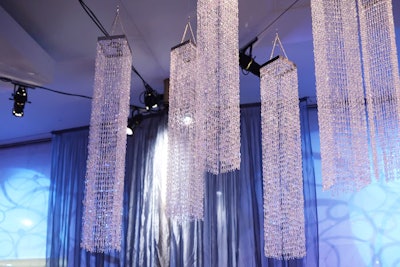 The venue's production department used a mix of blue projections and pinspots to illuminate the chandelier's icicle design and set the ambience for the wintery decor.