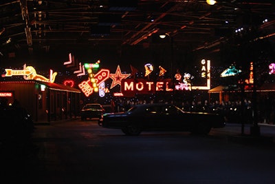 Months earlier, Coach marked its 75th anniversary in December in New York with a high-energy runway show on a set that took inspiration from a motel parking lot. Cartoonish neon representations of a gritty urban landscape created the backdrop.