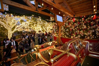 The setting mixed a classic sleigh and holiday lights with the high-tech VR experience.