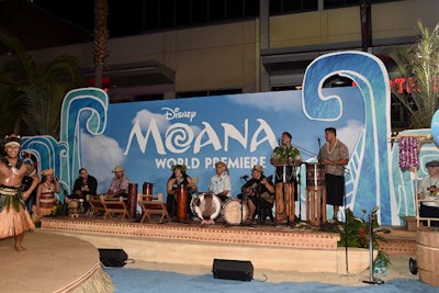 A stage setup featured a Hawaiian-inspired motif.