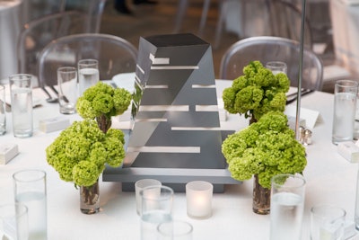 The Tate Americas Foundation's artist’s dinner, which took place in May in New York, featured decor and architectural centerpieces by David Stark that were inspired by the sharp geometry and twisting shape of the Tate Modern’s new building, which was soon to open.