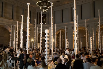 David Stark and his team designed the sixth annual Brooklyn Museum's Artists Ball, which took place in April at the New York museum. Inspired by Constantin Brancusi’s sculptures, particularly the “Endless Column,” and the party’s white-hot theme, Stark transformed the space with towering totems made from stacked rolls of household and industrial paper goods. They rose from the dining tables in varying heights, up to a soaring 21 feet.