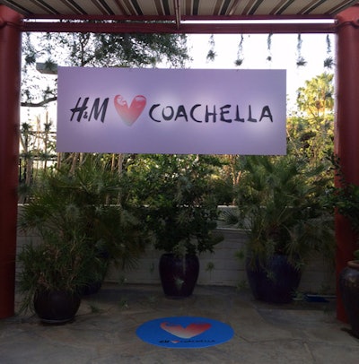 At the Coachella festival in 2015, H&M's intimate cocktail party in Palm Springs included an arrivals backdrop that had an open back, with hanging strands of greenery.