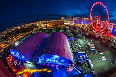 Amazon Web Service's re:Play party took over the High Roller Parking Lot in Las Vegas, where two megastructures housed the enormous production.