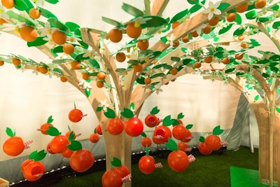 The activation, which was produced by MKTG, featured a wooden orange tree replica. The tree was decorated with plastic oversize oranges, some of which offered guests straws that resembled those on the Tropicana juice bottle logo.