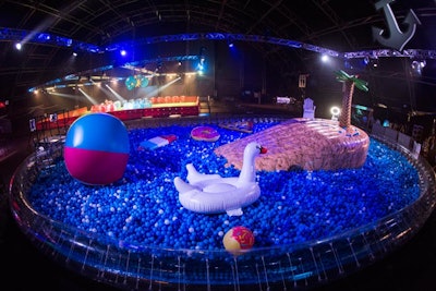 A vast ball pit held oversize inflatables and 140,000 blue balls.
