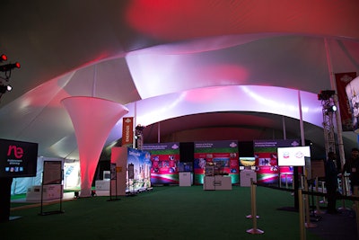 Inside the tents at Houston Live, sponsors such as Hess, Chevron, Sysco, and GE have created displays that work together to tell visitors about the city.