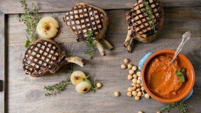 Pork Chops & Hazelnut Romesco. OTM creates every client menu from scratch.