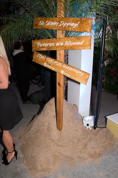Classic beach town signage, with accompanying sand mounds, listed the event’s hashtag #myvitality.