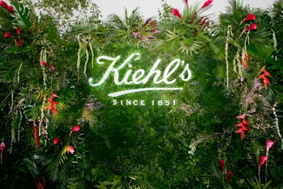 The step-and-repeat wall included an illuminated Kiehl’s logo and was adorned with lush tropical greenery, another nod to the natural skin care product.