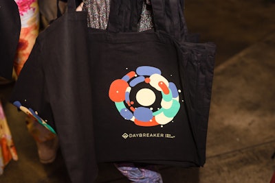 Guests received printed tote bags with the event's logo.