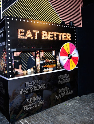 An 'eat better' station offered an array of deep-fried foods—and a spinning wheel to help guests decide which indulgence to choose.