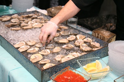 Oyster shuckers staffed the raw bar throughout the preview party on Thursday evening.