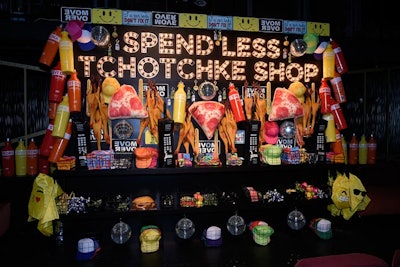 At the 'spend less' station, guests could scoop up tchotchkes they really didn't need.