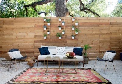 A gorgeous, chic and modern lounge featuring our Shandy Couch and Black Leather Paloma Chairs.