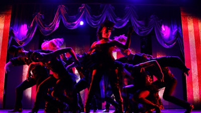 Dramatic lighting and innovative choreography for Broadway style performance