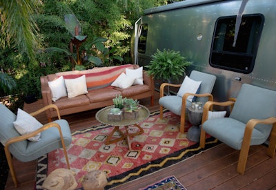 A mid-century modern jungle retreat, with our Sazerac Sofa and Midcentury Loungers.