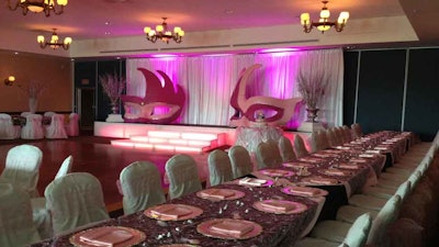 Miramar Cultural Center Banquet Hall sit down plated dinner with dance floor and stage.