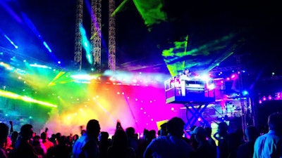 Dynamic lighting design for a large-scale ongoing event featuring DJ performances