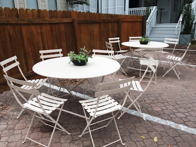 Easy, breezy, and timeless -- a relaxed dining setting featuring our French 75 Chairs and Tables.