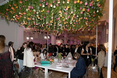 Agenc worked with Tinsel & Twine to design and create a lush floral canopy over the arts-and-crafts area.