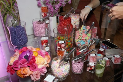 Guests filled goodie bags with an assortment of Valentine's Day candies and sweets.