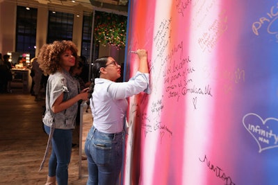 At the graffiti wall, guests were encouraged to write why they are “worth it.”