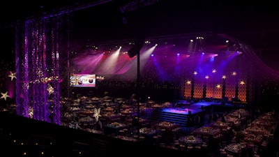 Overview image, post load in and pre-event, showing transformation of a hockey arena into an exclusive gala event