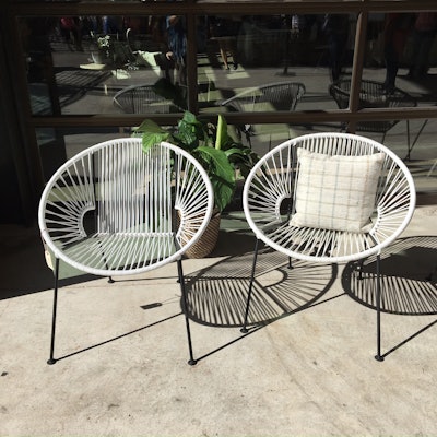 A closer look at our White Paloma Chairs; these guys not only look super cool but are also super comfy.
