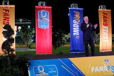 Colorful banners backed the stage as Orlando Mayor Buddy Dyer addressed the crowd at the Fans First kick-off event.