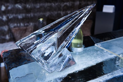 A paper airplane ice sculpture decorated the bar.