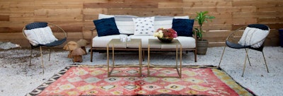 A gorgeous, chic and modern lounge featuring our Shandy Couch and Black Leather Paloma Chairs.